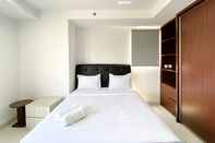 Bedroom Comfy and Spacious Studio Room Azalea Suites Apartment By Travelio