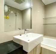 In-room Bathroom 2 Comfy and Spacious Studio Room Azalea Suites Apartment By Travelio