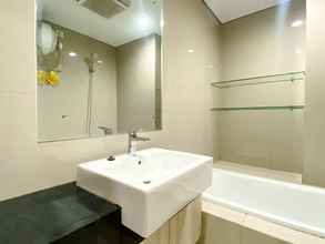 In-room Bathroom 4 Comfy and Spacious Studio Room Azalea Suites Apartment By Travelio