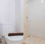 In-room Bathroom 3 Warm and Homey Studio Room at Taman Melati Margonda Apartment By Travelio