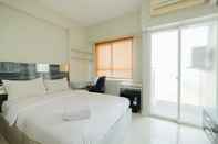 Bedroom Warm and Homey Studio Room at Taman Melati Margonda Apartment By Travelio