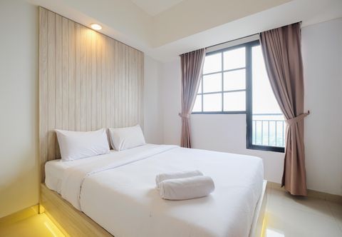 Bedroom Minimalist 1BR with Extra Room Apartment at Evenciio Margonda By Travelio