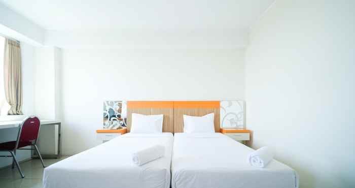 Bedroom Strategic Studio Room Apartment at High Point Serviced By Travelio