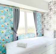 Bedroom 2 Comfortable and Homey 2BR Grand Sentraland Karawang Apartment By Travelio