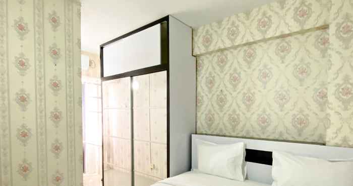 Bedroom Comfortable and Homey 2BR Grand Sentraland Karawang Apartment By Travelio