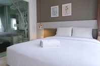 Kamar Tidur Luxury 1BR at Dago Suites Apartment By Travelio