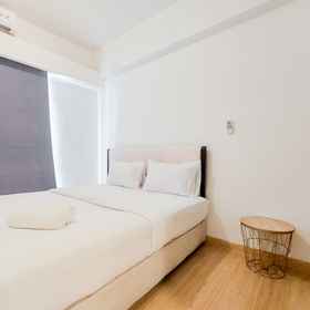 Bedroom 1 Comfortable and Spacious 2BR at Sky House BSD Apartment By Travelio, BSD Hotels