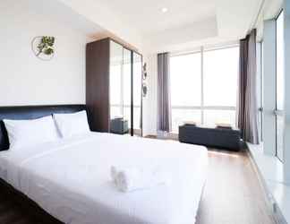 Bedroom 2 Minimalist with Beautiful View 2BR Apartment at Grand Sungkono Lagoon By Travelio