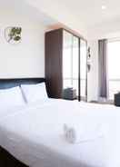 BEDROOM Minimalist with Beautiful View 2BR Apartment at Grand Sungkono Lagoon By Travelio