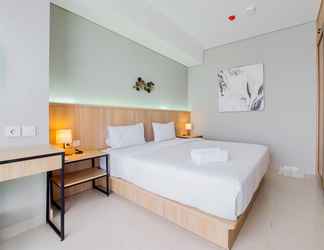 Bedroom 2 Comfort 1BR Apartment at Transpark Bintaro By Travelio