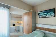 ห้องนอน Nginap Jogja at Apartemen Taman Melati (Comfort Room)