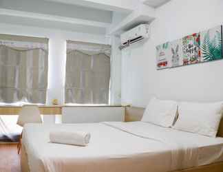 Bilik Tidur 2 Homey and Cozy Living Studio Patraland Urbano Apartment By Travelio