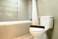 In-room Bathroom Nice and Cozy Studio at Azalea Suites Apartment By Travelio