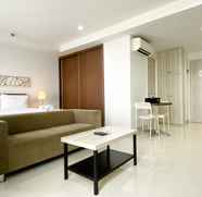 Lobi 2 Nice and Cozy Studio at Azalea Suites Apartment By Travelio