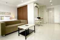 Lobi Nice and Cozy Studio at Azalea Suites Apartment By Travelio