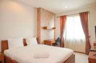 Kamar Tidur Homey and Beautiful 2BR Apartment Thamrin Residence By Travelio