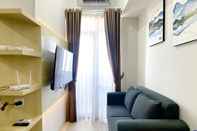 Common Space Cozy Living 1BR Apartment at Vasanta Innopark By Travelio