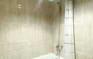 In-room Bathroom 5 Cozy Living 1BR Apartment at Vasanta Innopark By Travelio