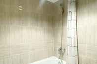 In-room Bathroom Cozy Living 1BR Apartment at Vasanta Innopark By Travelio
