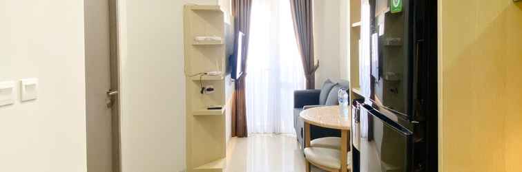 Lobby Cozy Living 1BR Apartment at Vasanta Innopark By Travelio