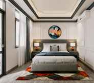 Bilik Tidur 2 Milestone Inn Hotel