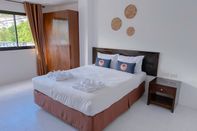 Phòng ngủ RoomQuest Kalim Beach