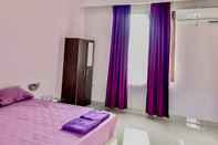 Kamar Tidur Tiara Guest House Mitra RedDoorz