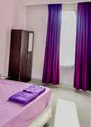 BEDROOM Tiara Guest House Mitra RedDoorz