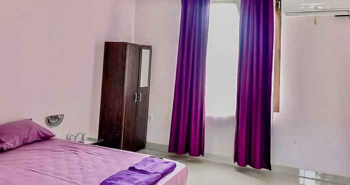 Bedroom Tiara Guest House Mitra RedDoorz