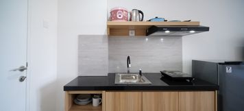 Common Space 3 New Studio and Comfy at CitraLand Vittorio Apartment By Travelio