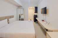 Kamar Tidur Homey and Scenic Studio Barsa City Apartment By Travelio