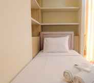 Bedroom 2 Spacious 2BR at Apartment Grand Asia Afrika By Travelio