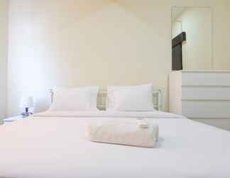 Bedroom 2 Spacious 2BR at Apartment Grand Asia Afrika By Travelio