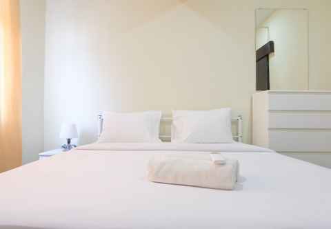 Bedroom Spacious 2BR at Apartment Grand Asia Afrika By Travelio