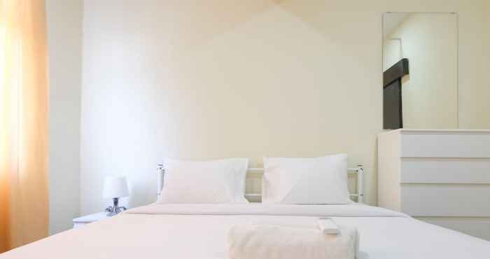 Bedroom Spacious 2BR at Apartment Grand Asia Afrika By Travelio