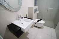 In-room Bathroom Spacey and Nice 1BR at The Via and The Vue Apartment By Travelio