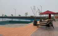 Swimming Pool 5 Nice and Fancy 2BR Osaka Riverview PIK 2 Apartment By Travelio
