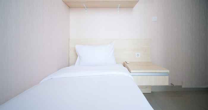 Bedroom Comfy and Good Location 2BR at Tamansari Papilio Apartment By Travelio