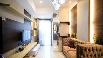 Common Space 4 Comfy and Good Location 2BR at Tamansari Papilio Apartment By Travelio