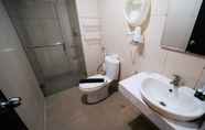 In-room Bathroom 5 Comfy and Good Location 2BR at Tamansari Papilio Apartment By Travelio