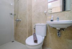In-room Bathroom 4 Restful and Cozy Studio at Transpark Cibubur Apartment By Travelio