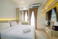 Kamar Tidur Restful and Cozy Studio at Transpark Cibubur Apartment By Travelio