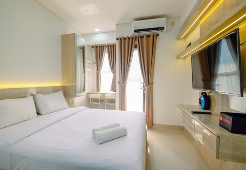 Bedroom Restful and Cozy Studio at Transpark Cibubur Apartment By Travelio