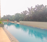 Swimming Pool 5 Restful and Cozy Studio at Transpark Cibubur Apartment By Travelio