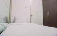 Bedroom 2 Stunning Apartment 2BR Green Bay Pluit  By Travelio