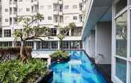 Kolam Renang 6 Nice and Best Homey Studio at Bintaro Icon Apartment By Travelio