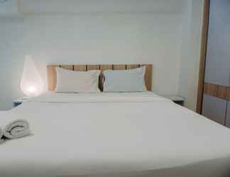 Kamar Tidur 2 Cozy Living and Modern Studio Loft at Kingland Avenue Apartment By Travelio