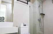 In-room Bathroom 3 Homey and Spacious Studio at Daan Mogot City Apartment By Travelio