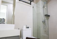 In-room Bathroom 3 Homey and Spacious Studio at Daan Mogot City Apartment By Travelio