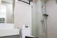 In-room Bathroom Homey and Spacious Studio at Daan Mogot City Apartment By Travelio